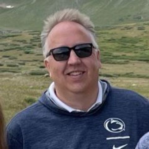 Headshot of Greg Roszyk