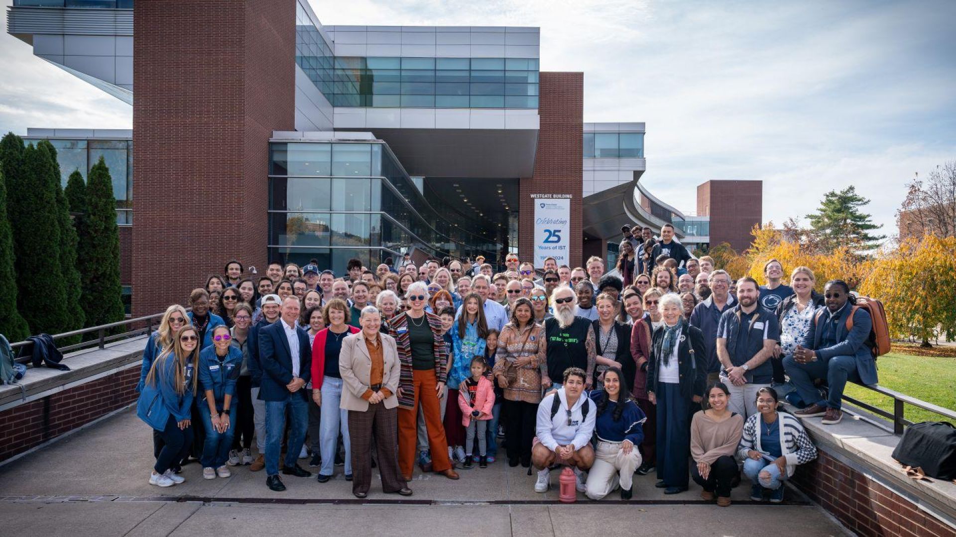 Alumni and friends in front of the Westgate Building.