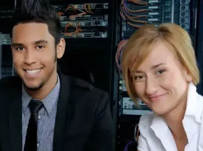 students in front of server rack