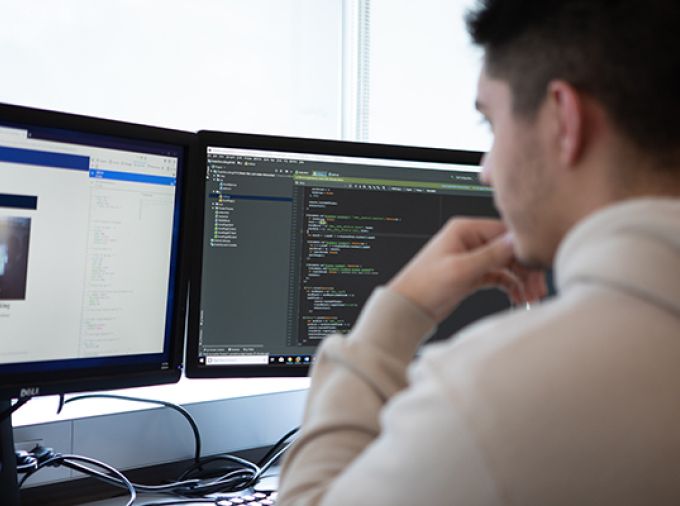 student working at computer
