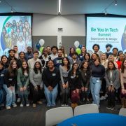 A group poses at the Be You in Tech Summit