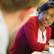 Student working on a laptop during class