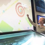 Students using data visualizations to understand campus traffic patterns