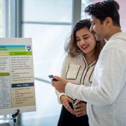 A student presents their work at the Student Success Showcase.