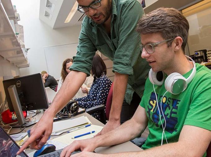 Students using a laptop computer