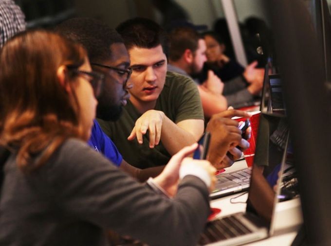Students working on laptop computers