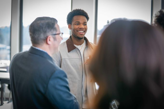 A student smiling.