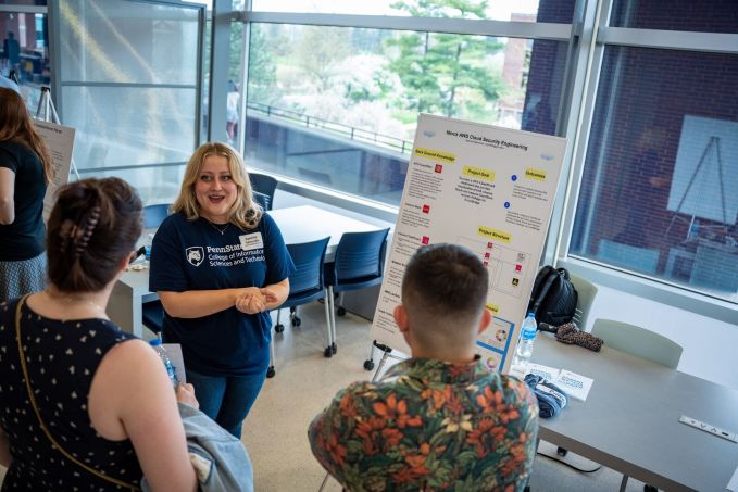 A student presents their work at the Student Success Showcase.