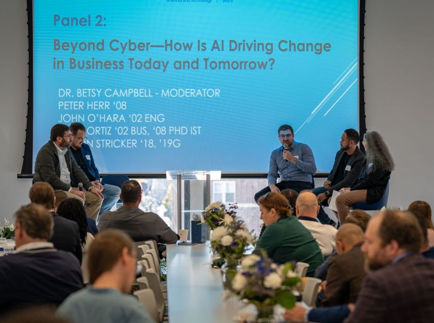 Alumni participate in a panel discussion.
