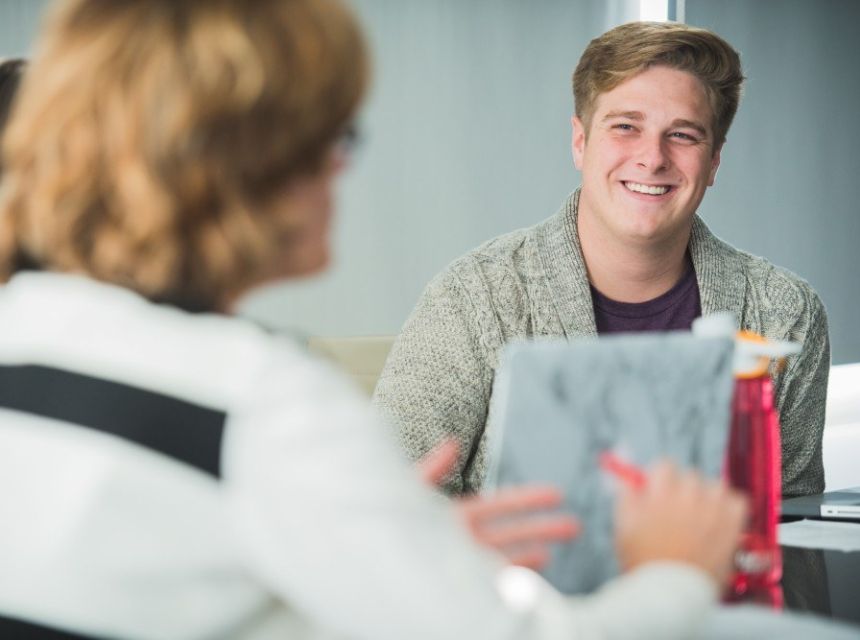 A student meets with a career counselor.