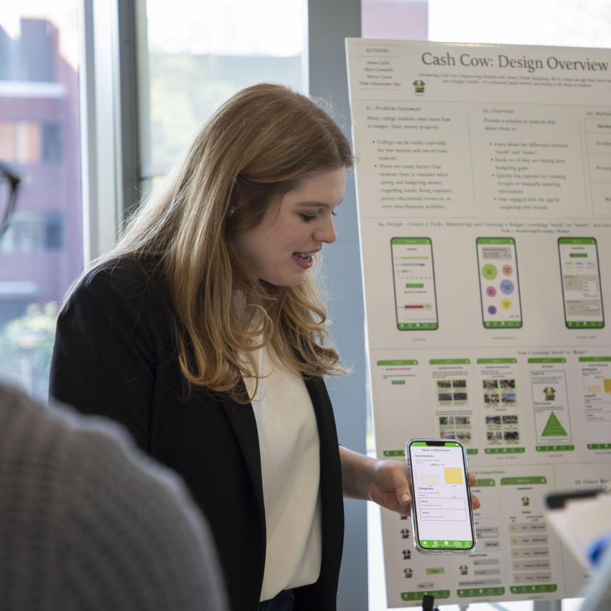 A student presents at the success showcase.