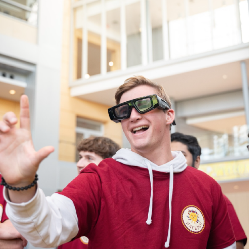 Student experiencing virtual reality during Hackathon.