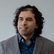 Shomir Wilson presents a lecture in a classroom.