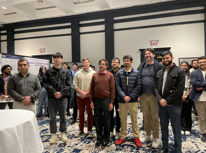 Participants pose at the AI Week event.
